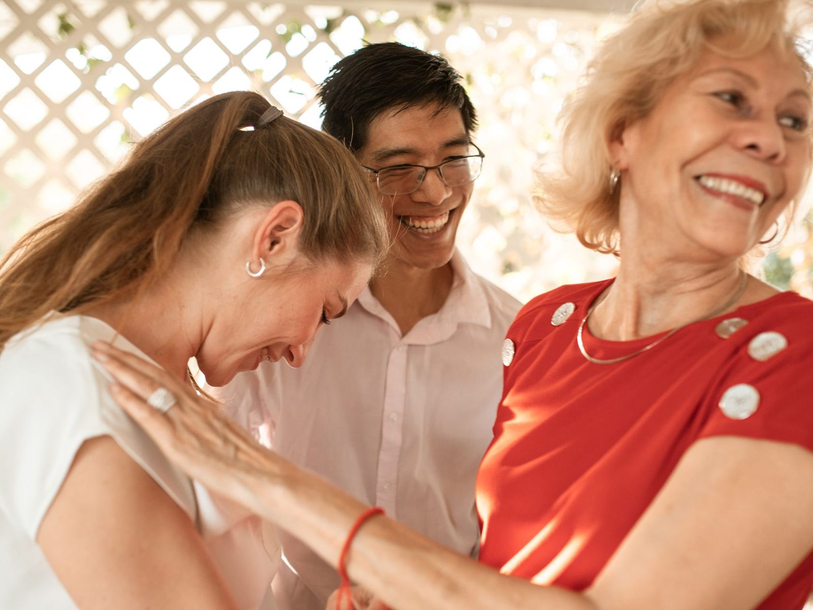 Members of a family of different generations sitting together and talking